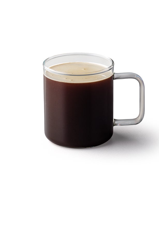 An americano in a glass mug