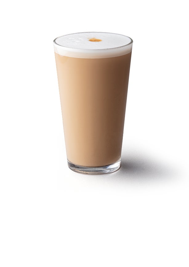 A latte macchiato in a tall glass