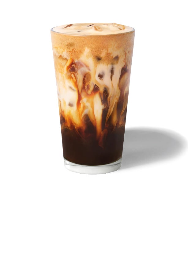 An iced brown sugar oat shaken espresso in a tall glass