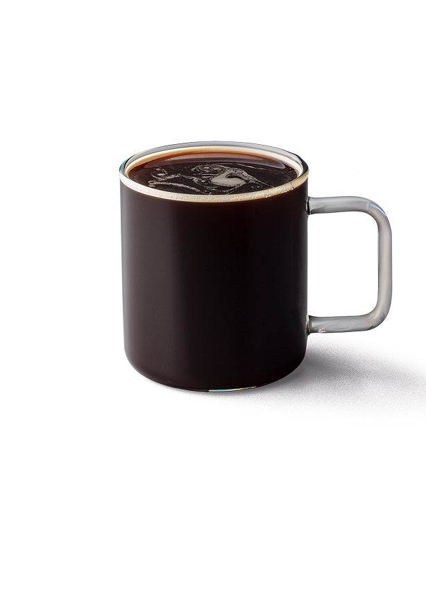 A filter coffee in a glass mug