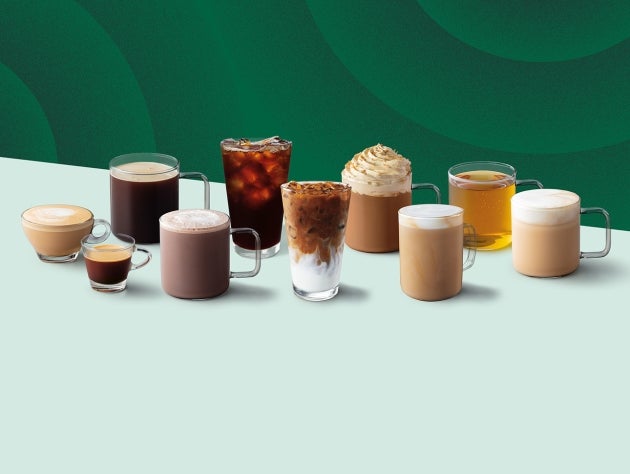A variety of coffee and other beverages arranged in two rows