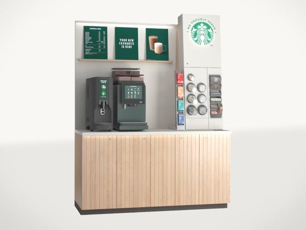 The We Proudly Serve Starbucks self-serve solution in grande: self-serve coffee machine, self-service ice machine and counter