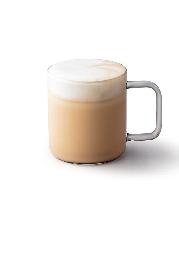 Een cappuccino in een glazen mok